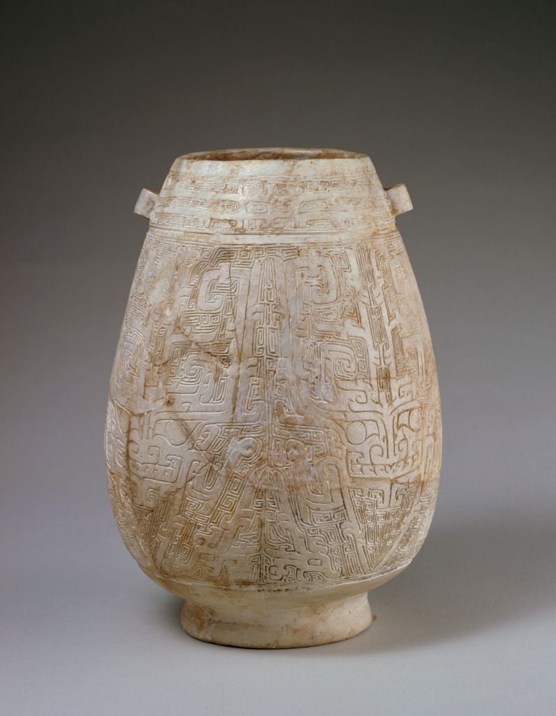 图片[1]-Double series pot with taotie pattern carved on white pottery-China Archive